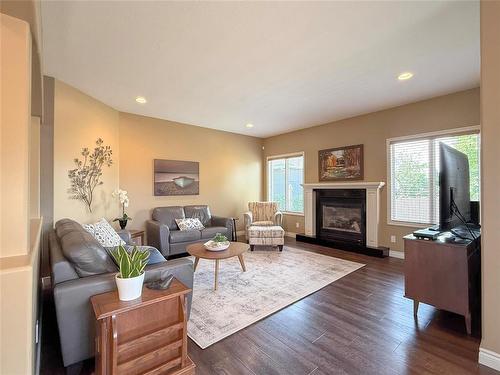 24 Brookwood Drive, Brandon, MB - Indoor Photo Showing Living Room With Fireplace