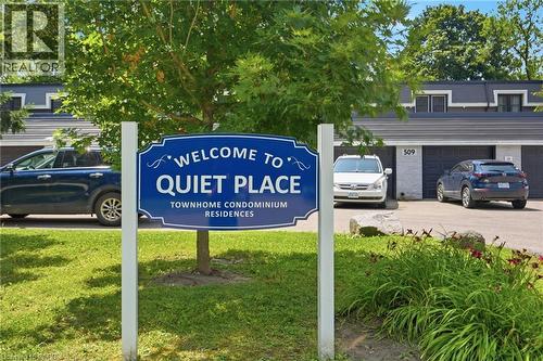 Townhouse condominium residences featuring mature trees and lush landscaping - 509 Quiet Place Unit# 1, Waterloo, ON - Outdoor