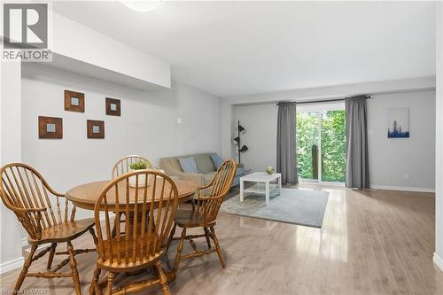 Open-concept living space featuring light wood-finish flooring, white walls, and recessed lighting - 509 Quiet Place Unit# 1, Waterloo, ON - Indoor Photo Showing Dining Room