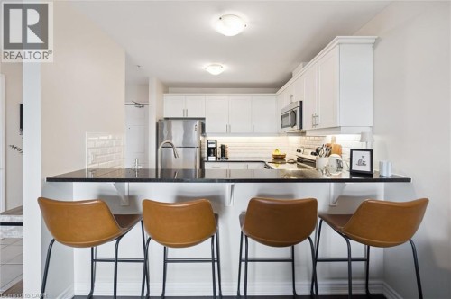 2 Colonial Drive Unit# 403, Guelph, ON - Indoor Photo Showing Kitchen With Stainless Steel Kitchen With Upgraded Kitchen