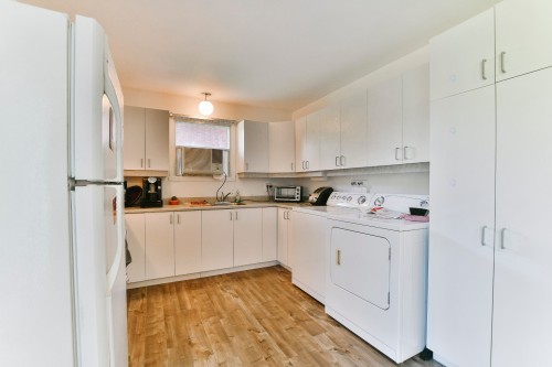 Cuisine - 639 Rue Faribault, L'Assomption, QC - Indoor Photo Showing Laundry Room