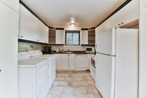 Cuisine - 639 Rue Faribault, L'Assomption, QC - Indoor Photo Showing Laundry Room
