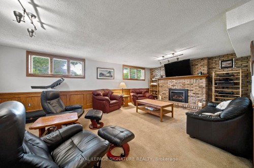 30 Andrew Street, Brant, ON - Indoor Photo Showing Living Room With Fireplace