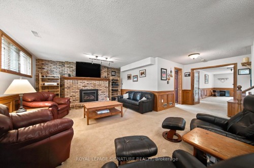 30 Andrew Street, Brant, ON - Indoor Photo Showing Living Room With Fireplace