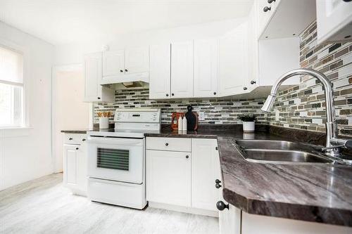 200 Beaverbrook St, Winnipeg, MB - Indoor Photo Showing Kitchen With Double Sink
