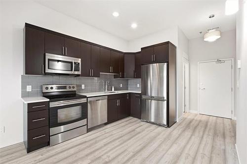 703-70 Barnes St, Winnipeg, MB - Indoor Photo Showing Kitchen With Stainless Steel Kitchen