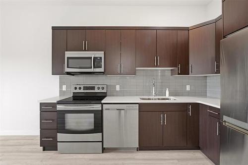703-70 Barnes St, Winnipeg, MB - Indoor Photo Showing Kitchen With Stainless Steel Kitchen