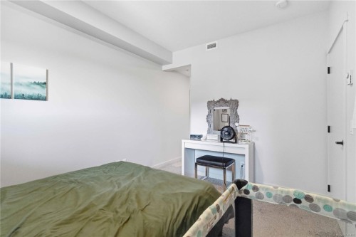 #206-2461 Gateway Rd, Langford, BC - Indoor Photo Showing Bedroom