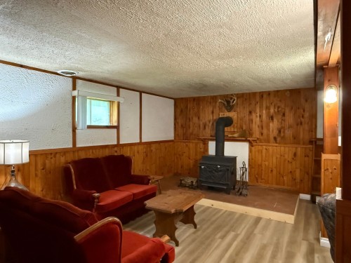 Family Room - 4470 Ch. De La Gare, Labelle, QC - Indoor With Fireplace
