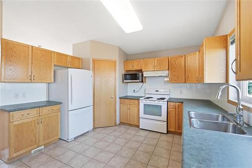 243 Bairdmore Blvd, Winnipeg, MB - Indoor Photo Showing Kitchen With Double Sink