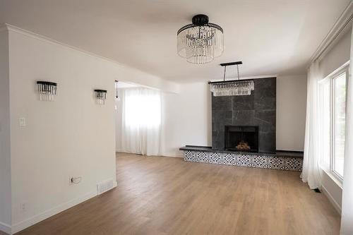 59 Arden Ave, Winnipeg, MB - Indoor Photo Showing Other Room With Fireplace
