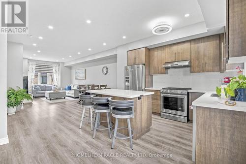 144 - 1890 Rymal Road E, Hamilton, ON - Indoor Photo Showing Kitchen With Stainless Steel Kitchen With Upgraded Kitchen