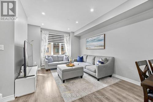 144 - 1890 Rymal Road E, Hamilton, ON - Indoor Photo Showing Living Room