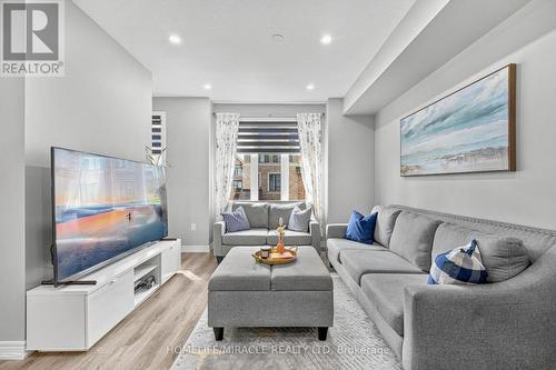 144 - 1890 Rymal Road E, Hamilton, ON - Indoor Photo Showing Living Room