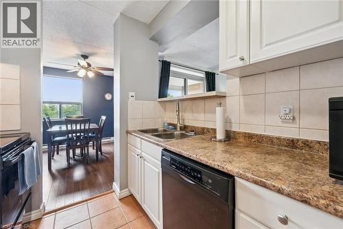 65 Silvercreek Parkway N Unit# 404, Guelph, ON - Indoor Photo Showing Kitchen With Double Sink