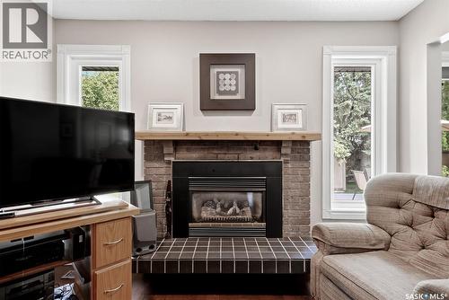 2118 Elderkin Drive E, Regina, SK - Indoor Photo Showing Living Room With Fireplace