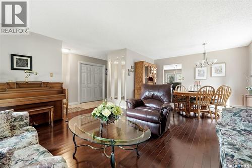 2118 Elderkin Drive E, Regina, SK - Indoor Photo Showing Living Room With Fireplace