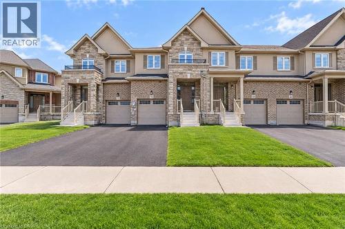 Stone and stucco exterior with multiple gables - 70 Bradbury Road, Hamilton, ON - Outdoor With Facade