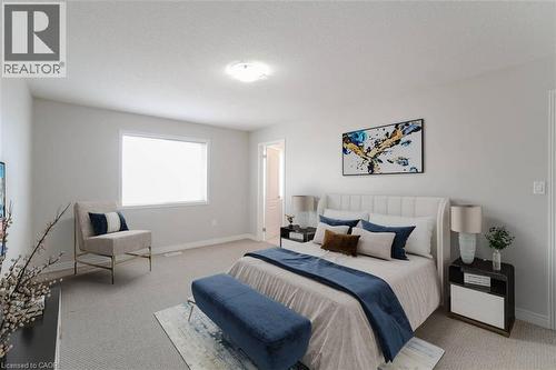 Carpeted flooring, recessed lighting, and a window with a white frame - 70 Bradbury Road, Hamilton, ON - Indoor Photo Showing Bedroom