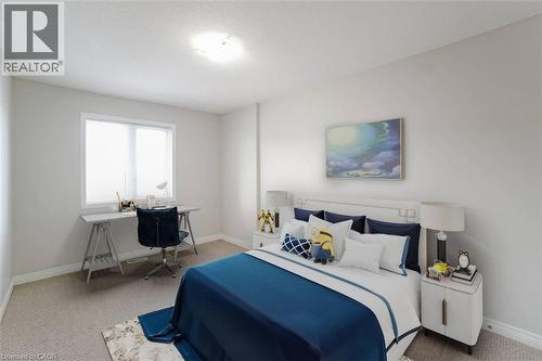 Recessed lighting, large window with natural illumination, light-colored walls, and neutral carpet flooring - 70 Bradbury Road, Hamilton, ON - Indoor Photo Showing Bedroom
