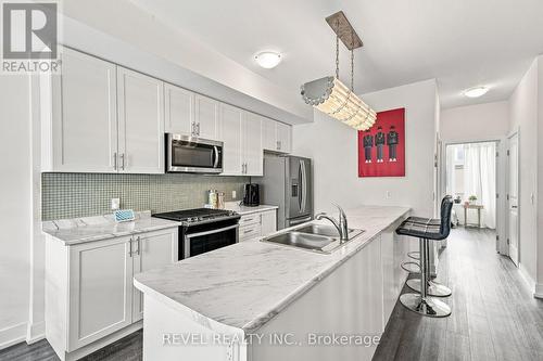 23 - 261 Skinner Road, Hamilton, ON - Indoor Photo Showing Kitchen With Double Sink With Upgraded Kitchen