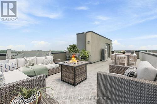 Virtually staged Rooftop - 23 - 261 Skinner Road, Hamilton, ON - Outdoor With Exterior
