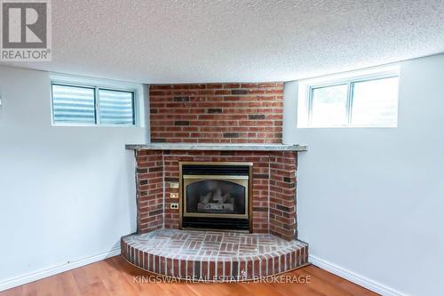 556 Barton Street E, Hamilton, ON - Indoor Photo Showing Living Room With Fireplace