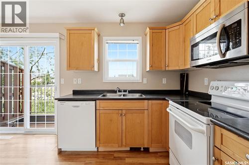 52 118 Pawlychenko Lane, Saskatoon, SK - Indoor Photo Showing Kitchen With Double Sink