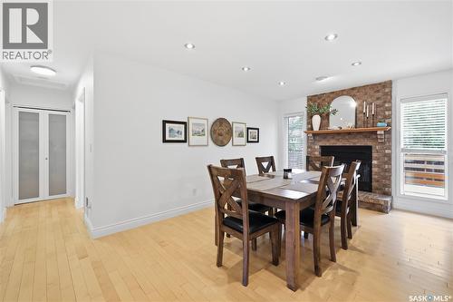 2206 Assiniboine Avenue E, Regina, SK - Indoor Photo Showing Dining Room With Fireplace