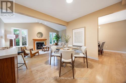 60 Woliston Crescent, Ottawa, ON - Indoor Photo Showing Dining Room With Fireplace