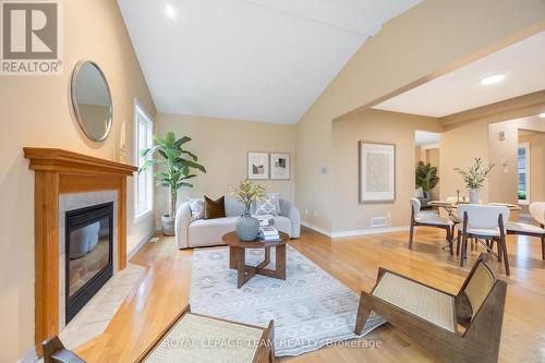 60 Woliston Crescent, Ottawa, ON - Indoor Photo Showing Living Room With Fireplace