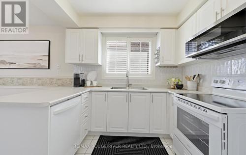 32 Patrick Drive, Whitby, ON - Indoor Photo Showing Kitchen With Double Sink