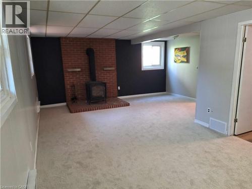48 Crestlynn Crescent, Simcoe, ON - Indoor Photo Showing Other Room With Fireplace