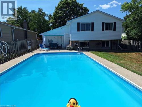 48 Crestlynn Crescent, Simcoe, ON - Outdoor With In Ground Pool With Backyard