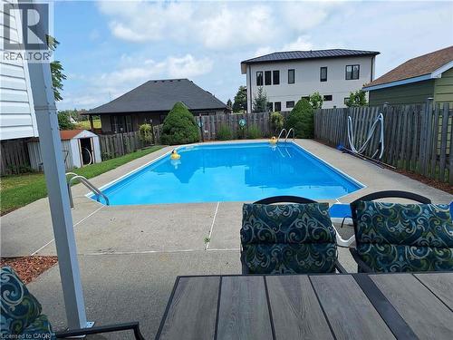 48 Crestlynn Crescent, Simcoe, ON - Outdoor With In Ground Pool