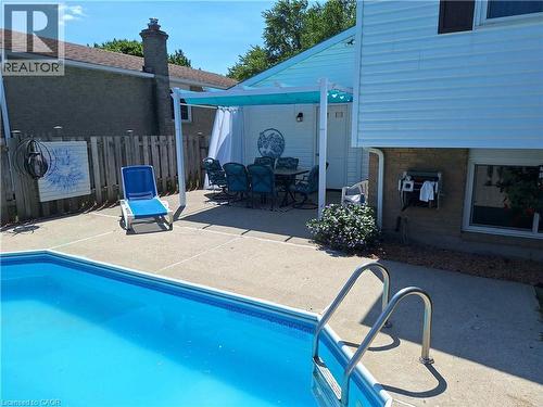 48 Crestlynn Crescent, Simcoe, ON - Outdoor With In Ground Pool