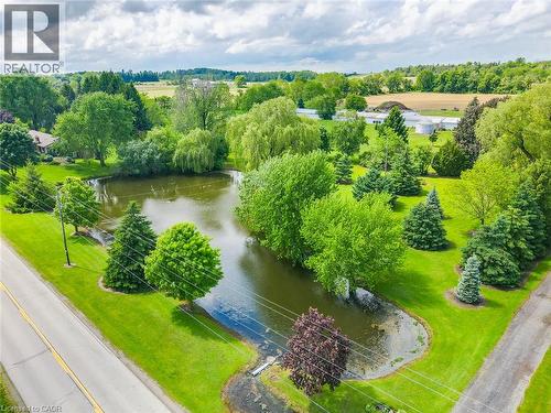 Expansive green space featuring a large pond - 875 Safari Road, Hamilton, ON 
