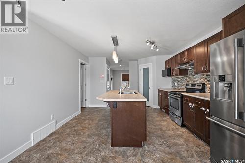 5234 Campling Avenue, Regina, SK - Indoor Photo Showing Kitchen With Double Sink