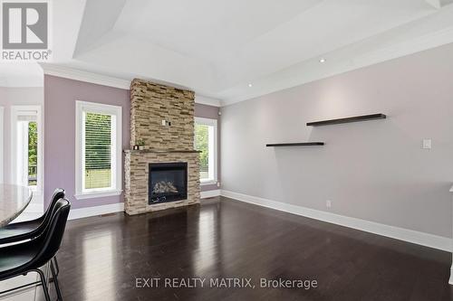501 Du Parc Road, Champlain, ON - Indoor Photo Showing Living Room With Fireplace