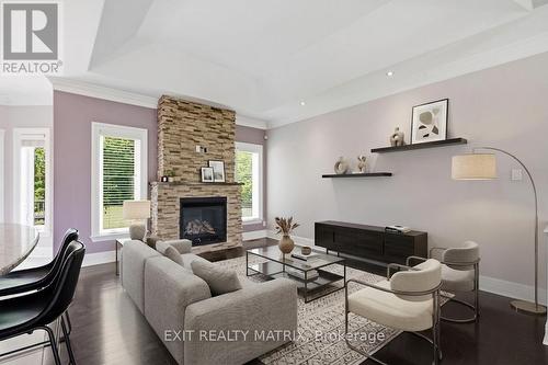 Virtually Staged - 501 Du Parc Road, Champlain, ON - Indoor Photo Showing Living Room With Fireplace