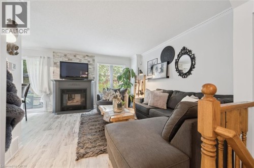 199 Saginaw Parkway Unit# 15, Cambridge, ON - Indoor Photo Showing Living Room With Fireplace