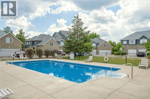 199 Saginaw Parkway Unit# 15, Cambridge, ON - Outdoor With In Ground Pool With Deck Patio Veranda