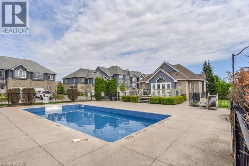 199 Saginaw Parkway Unit# 15, Cambridge, ON - Outdoor With In Ground Pool