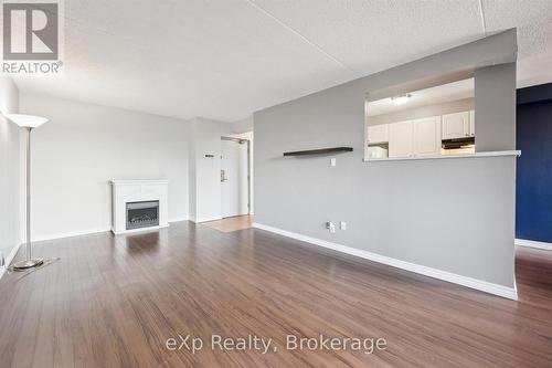 404 - 65 Silvercreek Parkway N, Guelph (Junction/Onward Willow), ON - Indoor With Fireplace