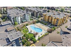 8 buildings surround the pool area. - 