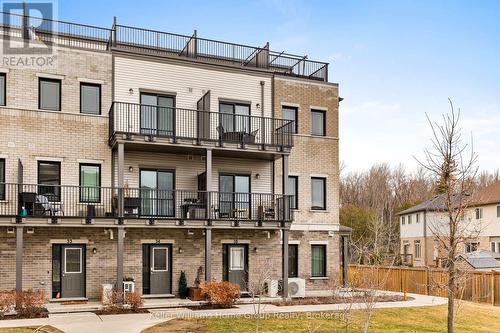 35 - 107 Westra Drive, Guelph (Willow West/Sugarbush/West Acres), ON - Outdoor With Deck Patio Veranda With Facade