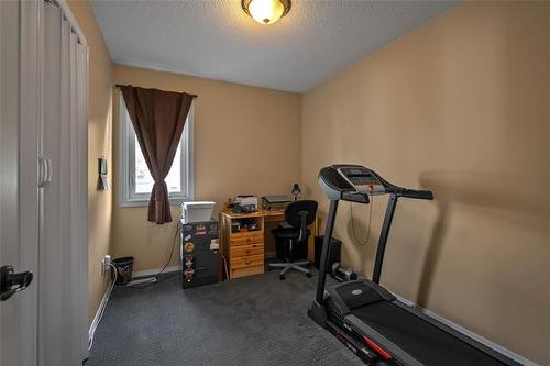 159 Trudell Bay, Winnipeg, MB - Indoor Photo Showing Gym Room