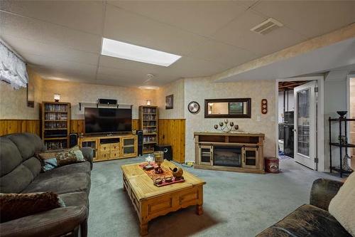 159 Trudell Bay, Winnipeg, MB - Indoor Photo Showing Living Room With Fireplace