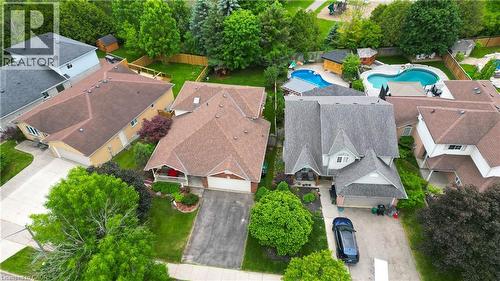 Aerial view showcasing a residential property with a multi-gabled roofline and attached garage - 599 Coldstream Drive, Waterloo, ON - Outdoor