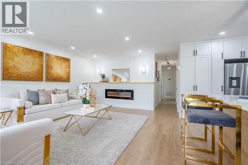 23 Tyrone Drive, Hamilton, ON - Indoor Photo Showing Living Room With Fireplace